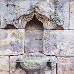 A stoup is a basin for holy water, especially on the wall near the door of a Roman Catholic church, for worshippers to dip their fingers in before crossing themselves.