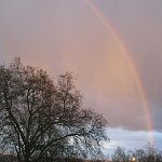 A late afternoon shower resulted in a gold-filled rainbow, looking south from Hampstead Heath, London.